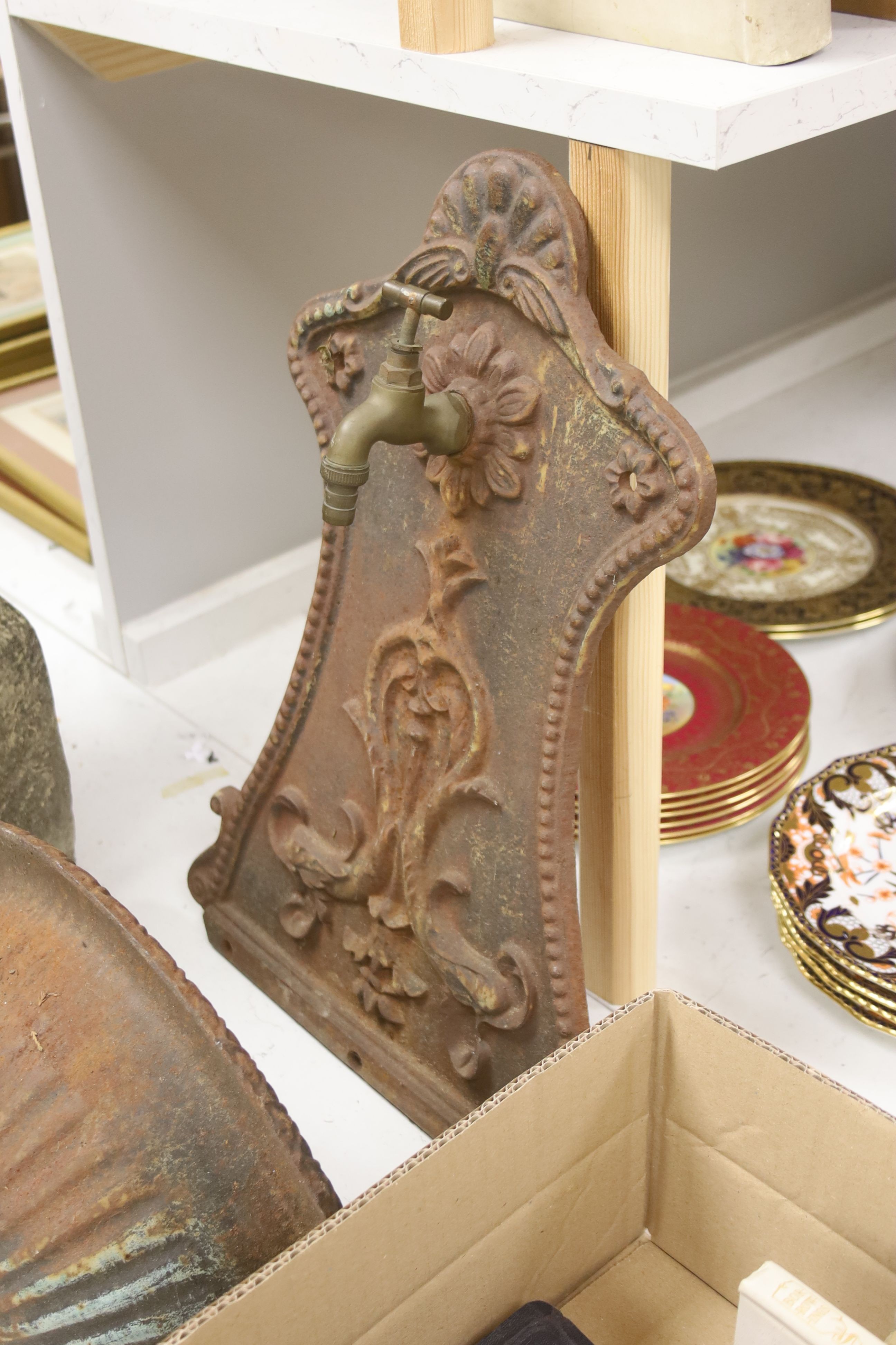 A French cast iron wall fountain